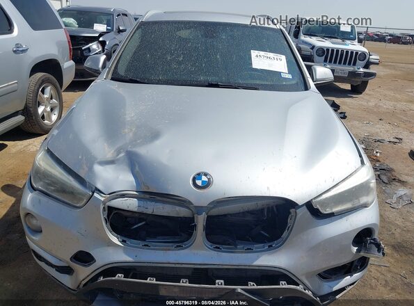 WBXHT3C36J5K24382 2018 BMW X1 Silver Dashboard view