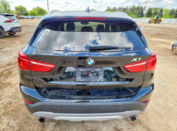 WBXHT3C37G5E49504 2016 BMW X1 Black Вид ззаду