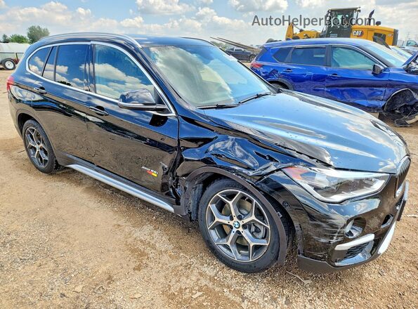 WBXHT3C37G5E49504 2016 BMW X1 Black Передня права чверть