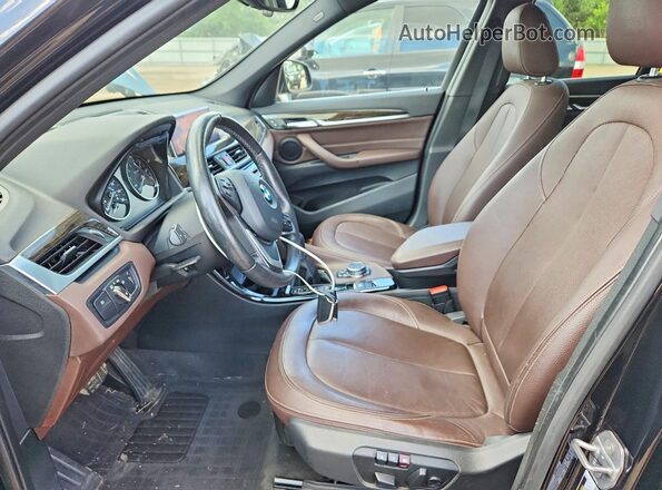 WBXHT3C37G5E49504 2016 BMW X1 Black Вид салону спереду