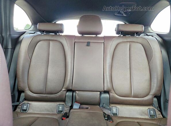 WBXHT3C37G5E49504 2016 BMW X1 Black Вид задніх сидінь