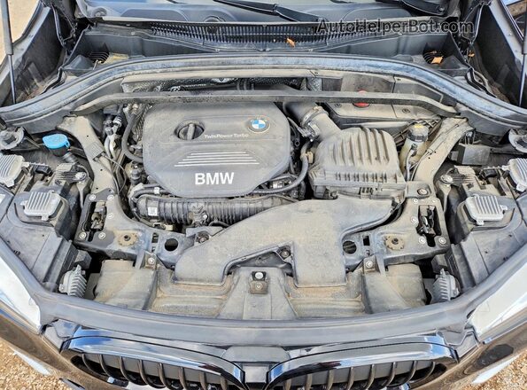 WBXHT3C37G5E49504 2016 BMW X1 Black Вид підкапотного простору