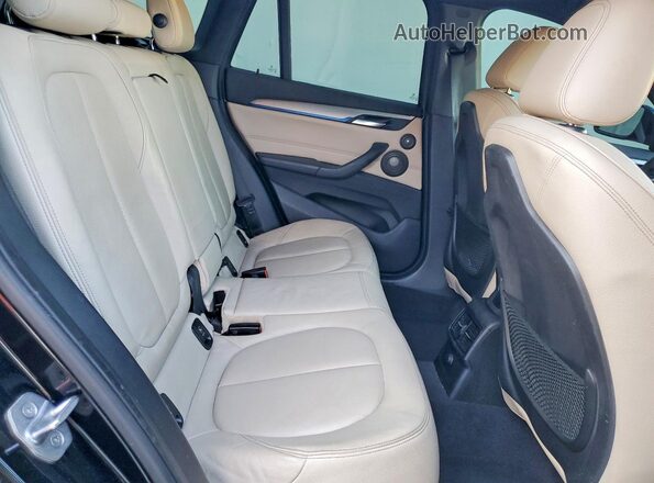 WBXHT3C37G5E52841 2016 BMW X1 Black Widok wnętrza z tyłu