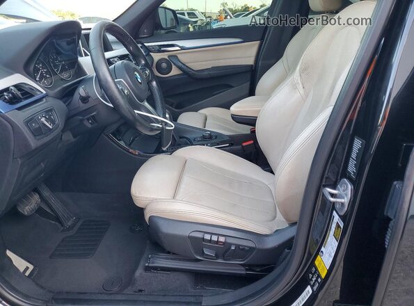 WBXHT3C37G5E52841 2016 BMW X1 Black Widok wnętrza z przodu