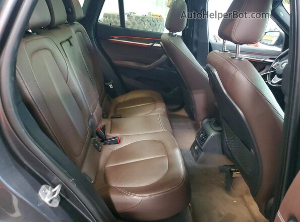 WBXHT3C37GP880202 2016 BMW X1 Gray Հետևի նստատեղերի տեսք