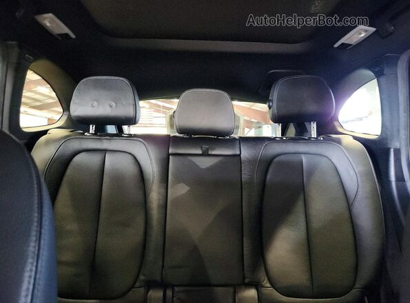 WBXHT3C37H5F85875 2017 BMW X1 Black Вид задніх сидінь