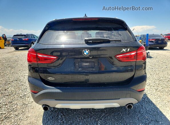 WBXHT3C37J5K29932 2018 BMW X1 Black Вид ззаду