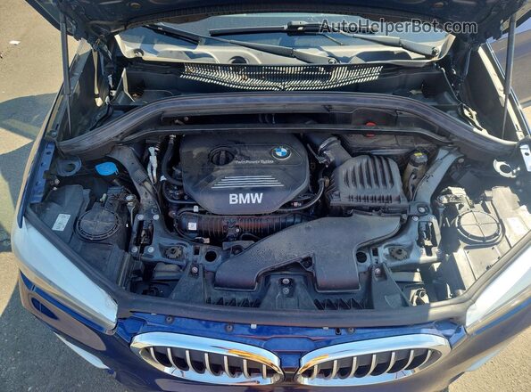 WBXHT3C37J5L27973 2018 BMW X1 Blue Вид задньої частини салону