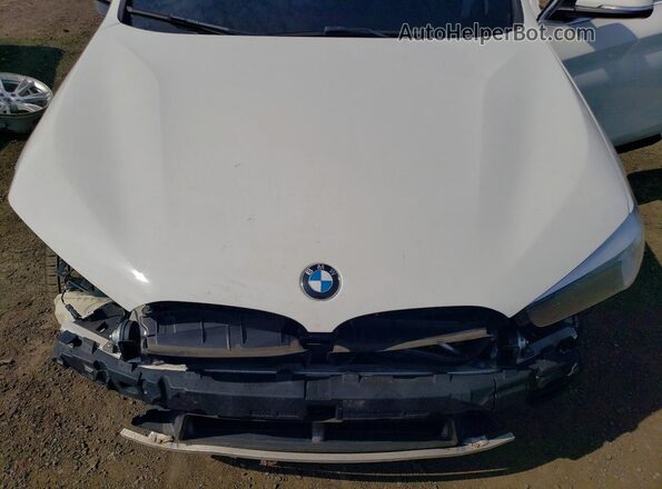 WBXHT3C37J5L30999 2018 BMW X1 White Engine compartment view