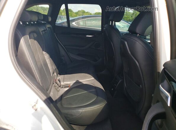 WBXHT3C37J5L30999 2018 BMW X1 White Rear interior view
