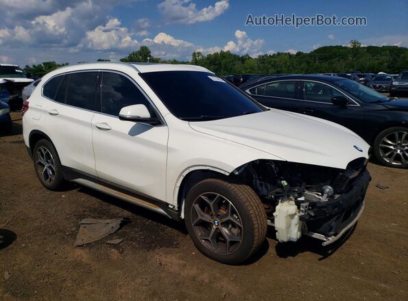 WBXHT3C37J5L30999 2018 BMW X1 White Front right
