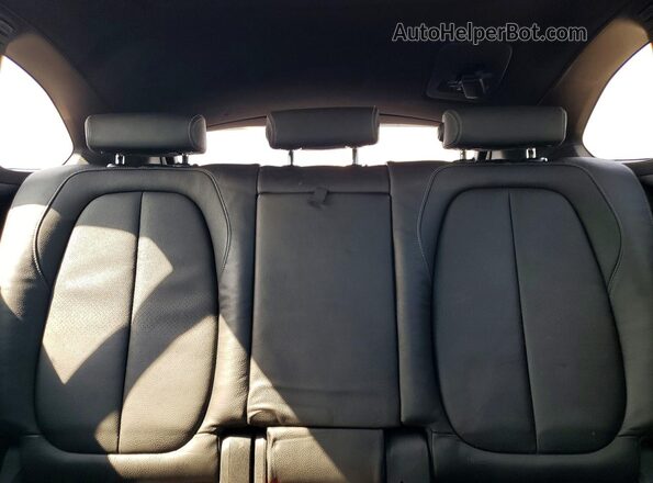 WBXHT3C37J5L30999 2018 BMW X1 White Rear seats view