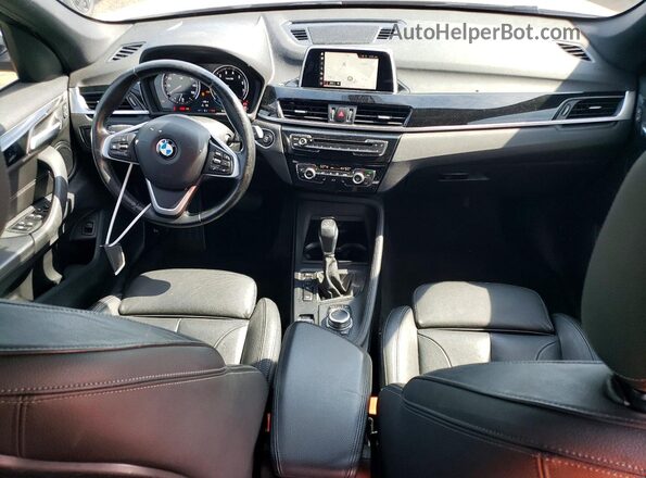 WBXHT3C37J5L30999 2018 BMW X1 White Dashboard view