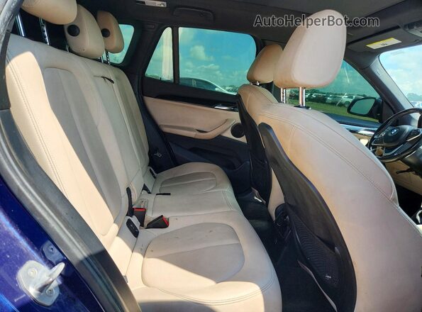 WBXHT3C37J5L32834 2018 BMW X1 Синий Вид задней части салона