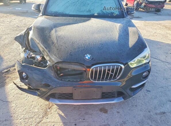 WBXHT3C38H5F74495 2017 BMW X1 Black უკანა სალონის ხედი
