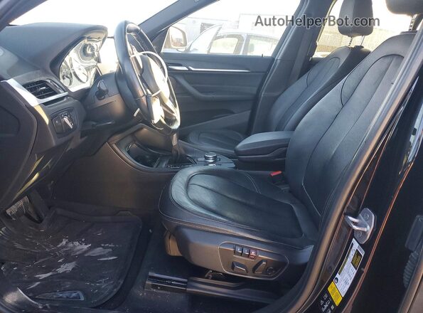 WBXHT3C38H5F74495 2017 BMW X1 Black წინა სალონის ხედი