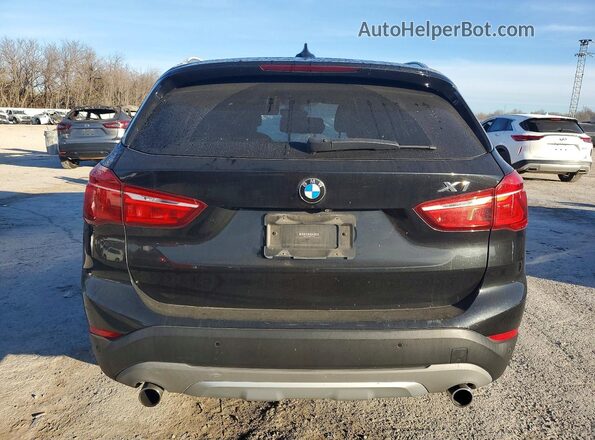 WBXHT3C38H5F74495 2017 BMW X1 Black უკანა ხედი