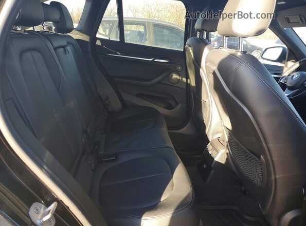 WBXHT3C38H5F74495 2017 BMW X1 Black უკანა სავარძლების ხედი