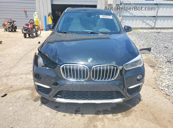 WBXHT3C38H5F77414 2017 BMW X1 Black Front view