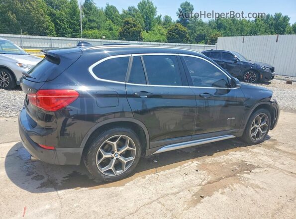 WBXHT3C38H5F77414 2017 BMW X1 Black Rear right