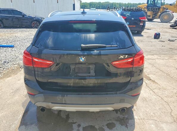 WBXHT3C38H5F77414 2017 BMW X1 Black Rear view