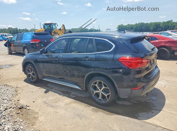 WBXHT3C38H5F77414 2017 BMW X1 Black Rear left