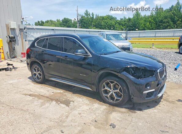 WBXHT3C38H5F77414 2017 BMW X1 Black Front right