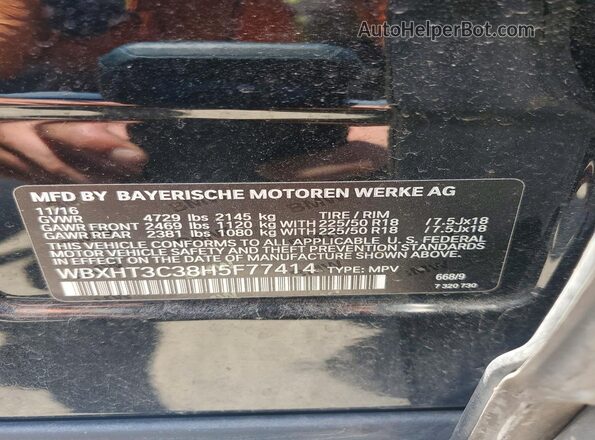 WBXHT3C38H5F77414 2017 BMW X1 Black VIN sticker view