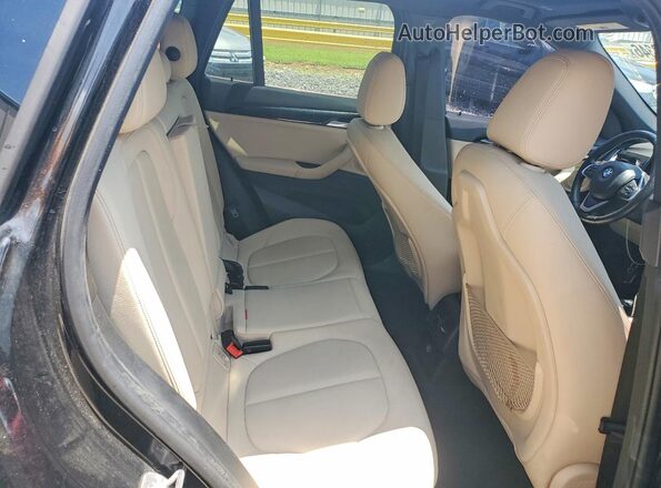 WBXHT3C38H5F77414 2017 BMW X1 Black Rear seats view