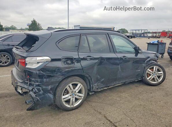 WBXHT3C38H5F82127 2017 BMW X1 Black Trasero derecho