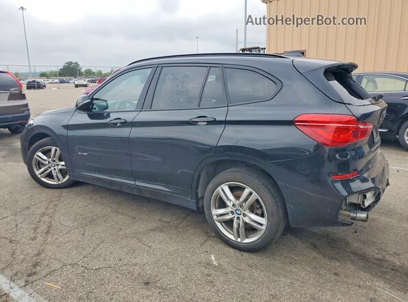 WBXHT3C38H5F82127 2017 BMW X1 Black Trasero izquierdo