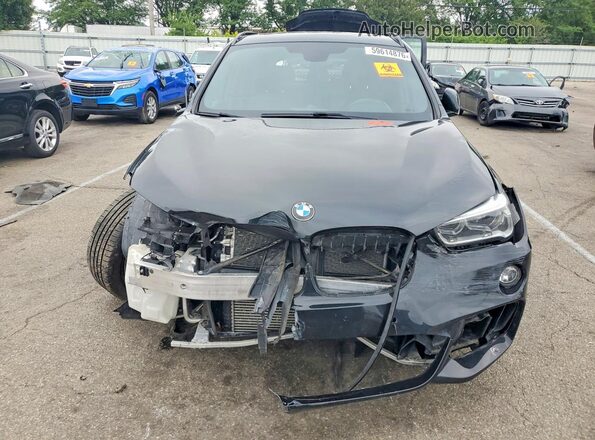 WBXHT3C38H5F82127 2017 BMW X1 Black Vista frontal