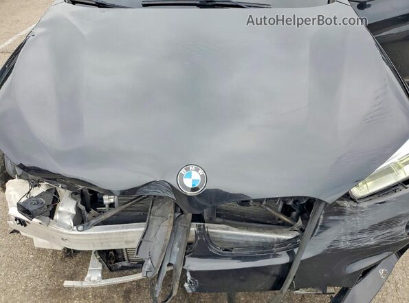 WBXHT3C38H5F82127 2017 BMW X1 Black Vista del compartimento del motor