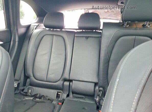 WBXHT3C38H5F82127 2017 BMW X1 Black Vista de los asientos traseros