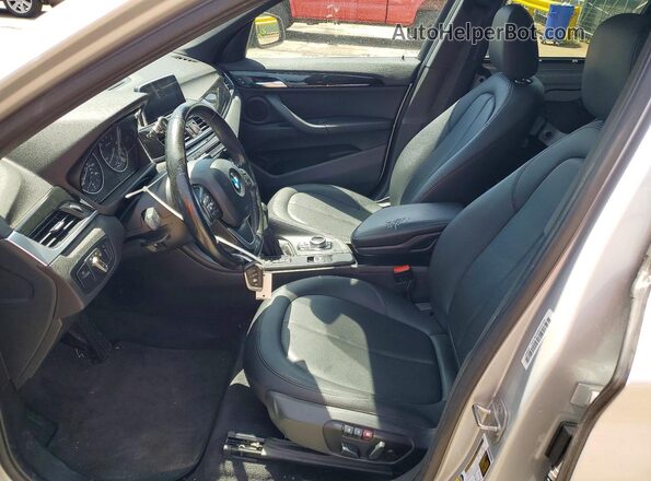 WBXHT3C38J5F93201 2018 BMW X1 Silver Front interior view