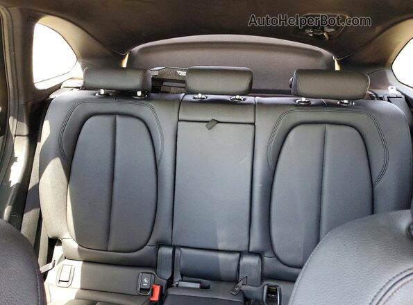 WBXHT3C38J5F93201 2018 BMW X1 Silver Rear seats view