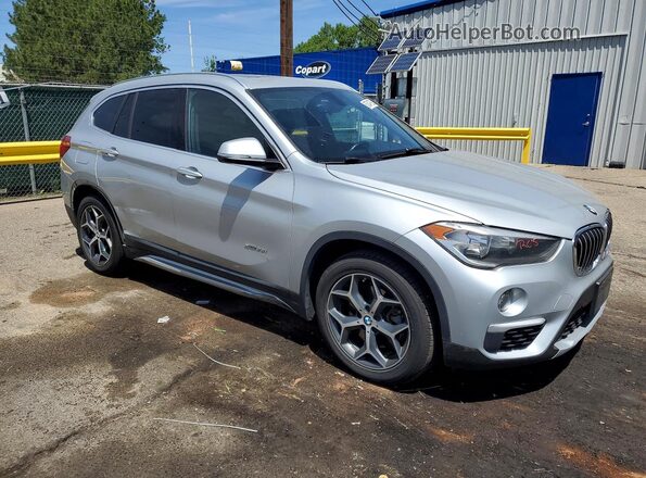 WBXHT3C38J5F93201 2018 BMW X1 Silver Front right