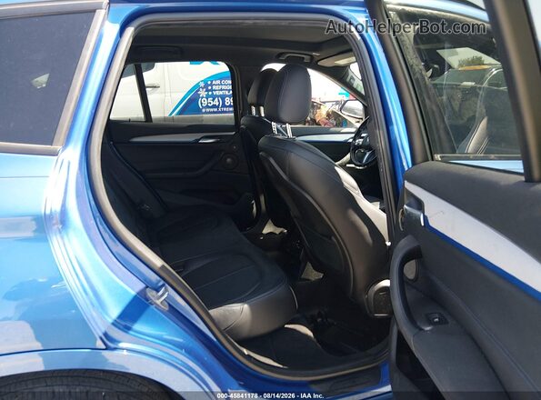 WBXHT3C38J5K28675 2018 BMW X1 Blue VIN კოდის სტიკერის ხედი