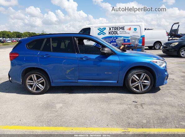 WBXHT3C38J5K28675 2018 BMW X1 Blue ხელსაწყოთა პანელის ხედი