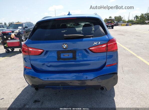 WBXHT3C38J5K28675 2018 BMW X1 Blue 