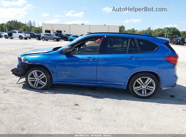 WBXHT3C38J5K28675 2018 BMW X1 Blue უკანა სალონის ხედი
