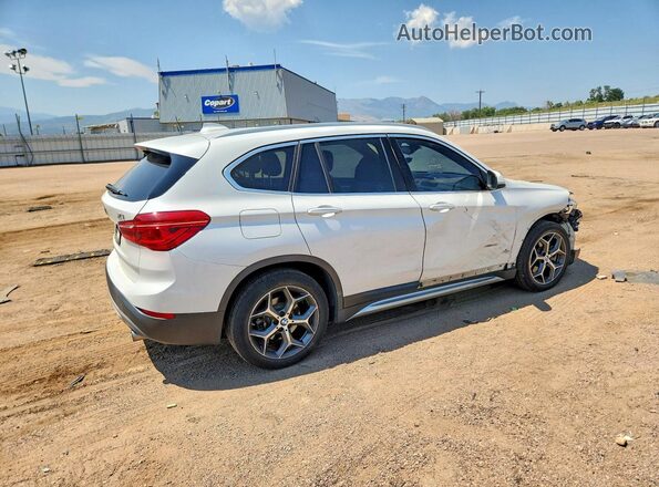 WBXHT3C38J5L25889 2018 BMW X1 White Trasero derecho