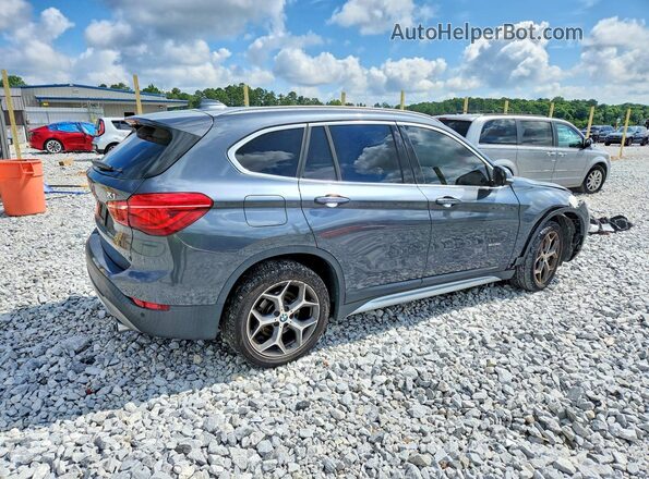 WBXHT3C39G5F63794 2016 BMW X1 Gray Rear right