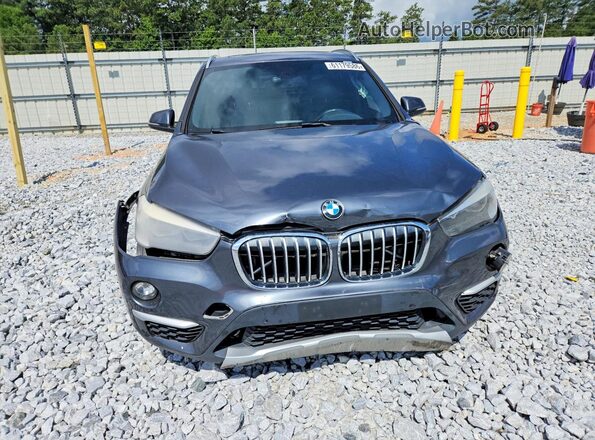 WBXHT3C39G5F63794 2016 BMW X1 Gray Front view