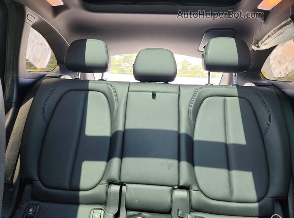 WBXHT3C39G5F63794 2016 BMW X1 Gray Rear seats view