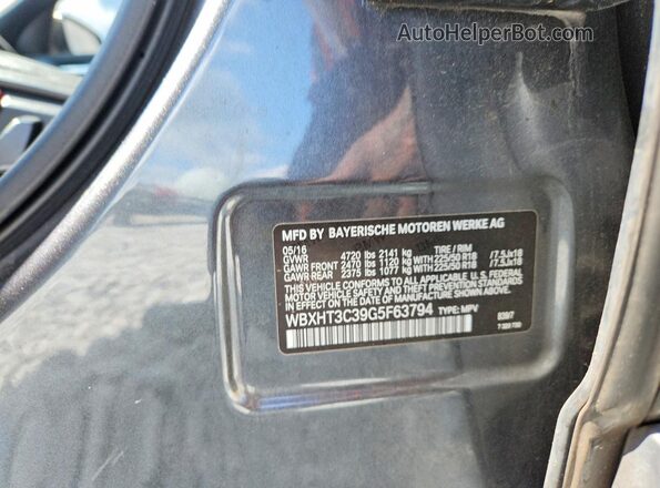 WBXHT3C39G5F63794 2016 BMW X1 Gray VIN sticker view