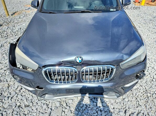 WBXHT3C39G5F63794 2016 BMW X1 Gray Engine compartment view