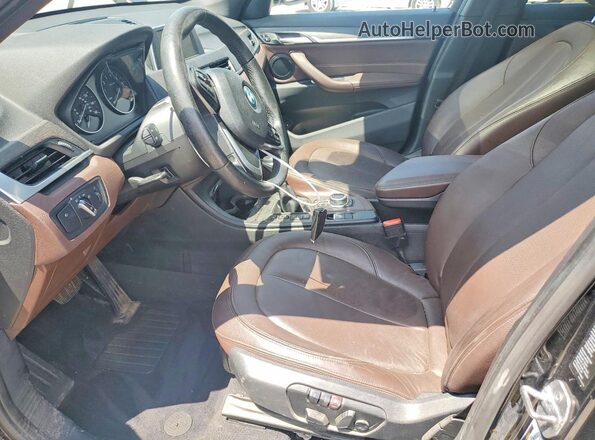 WBXHT3C39H5F76434 2017 BMW X1 Black წინა სალონის ხედი