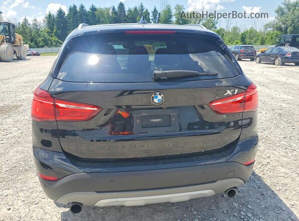 WBXHT3C39H5F76434 2017 BMW X1 Black უკანა ხედი