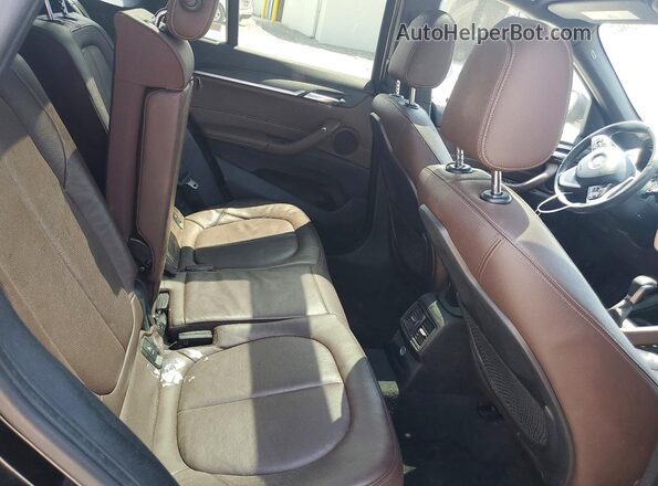 WBXHT3C39H5F76434 2017 BMW X1 Black უკანა სალონის ხედი